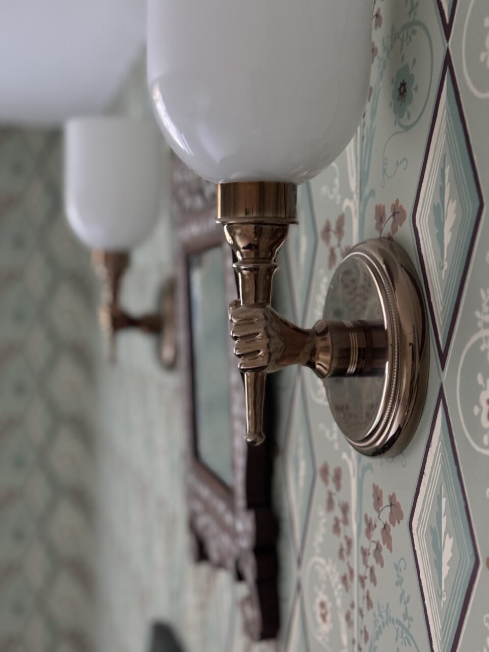 Wall Sconce Detail Small Hand Holding Light