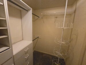 Non-optimized closet space with not quite sturdy built-ins